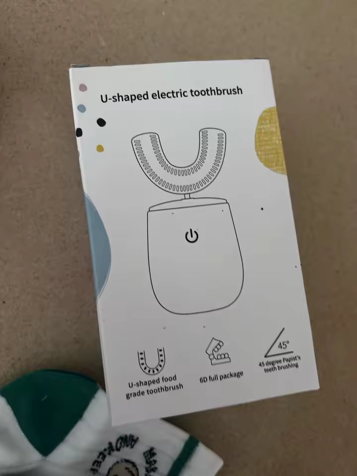 SnugBrush U-shaped electric toothbrush retail box